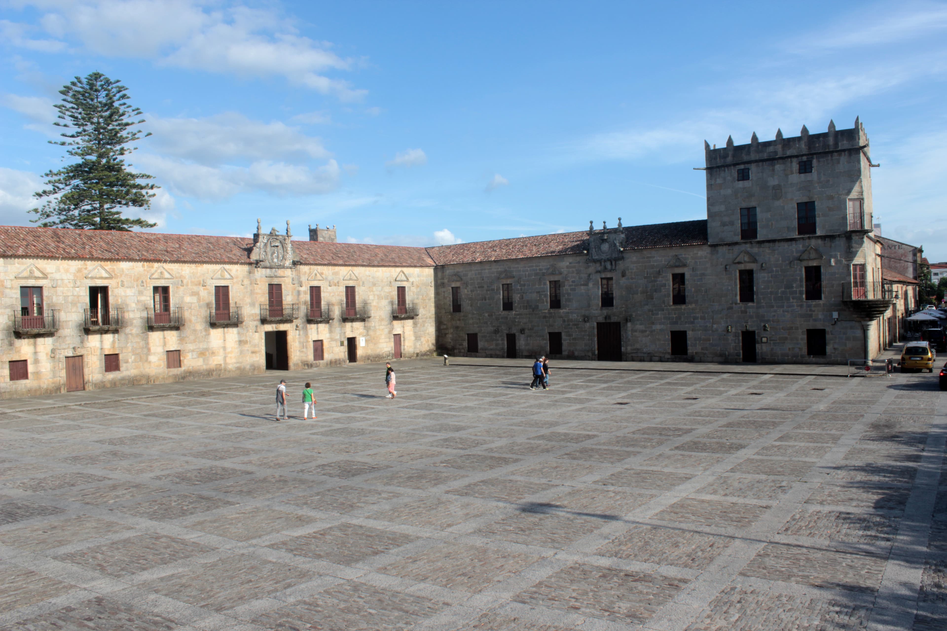 The long granite façade of Palacio de Fefiñanes facing the square in Cambados